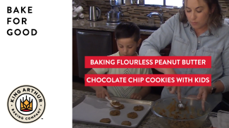 Libby and Ridge scooping cookie dough onto half sheet pan